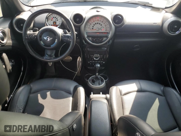 2012 MINI Countryman S with VIN WMWZC5C54CWL57554, listed as a Copart auction lot 59699865 with 144,737 mi miles and Salvage title. Bid and sale history available at DreamBid. Image 8.