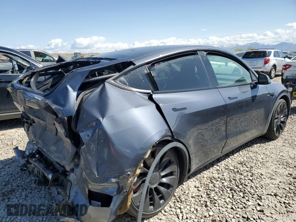 2022 Tesla Model Y Performance with VIN 7SAYGDEF1NF466938, listed as a Copart auction lot 53678045 with 50,135 mi miles and Salvage Title. Bid and sale history available at DreamBid. Image 3.