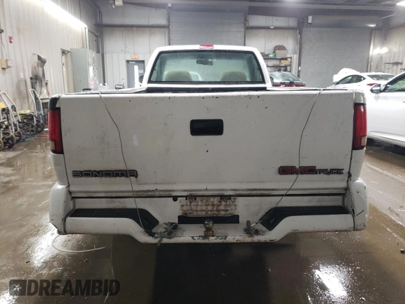 1995 GMC Sonoma z VIN 1GTCS14Z9S8537833, wystawiony jako Copart lot #78534234 z przebiegiem 187 729 mil mil oraz Szkoda całkowita • Salvage title. Historia ofert i sprzedaży dostępna na DreamBid. Obrazek 6.