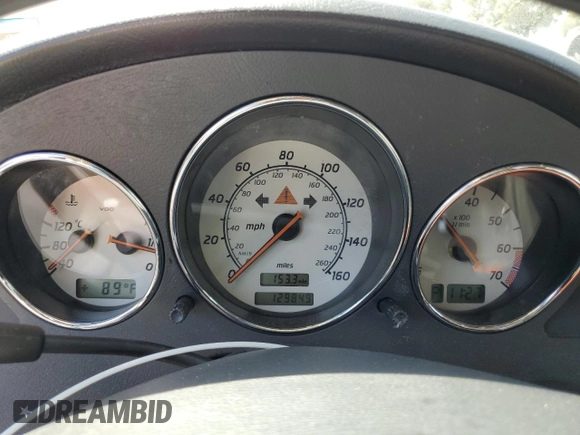 2001 Mercedes-Benz SLK-Class with VIN WDBKK65F81F210099, listed as a Copart auction lot 52606105 with 129,849 mi miles and Salvage Title. Bid and sale history available at carsss.com. Image 9.