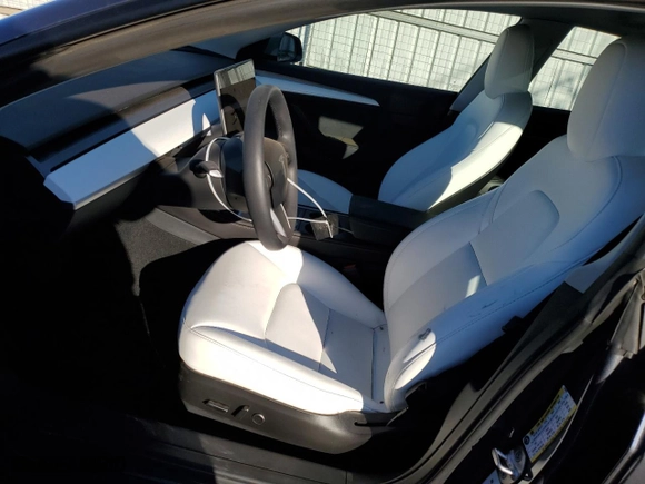 2023 Tesla Model 3 with VIN 5YJ3E1EA1PF654281, listed as a Copart auction lot 87509225 with 15,834 mi miles and Salvage Title. Bid and sale history available at carsss.com. Image 7.