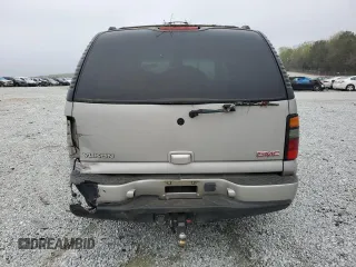2005 GMC Yukon Denali z VIN 1GKEK63U25J187670, wystawiony jako Copart lot #51669995 z przebiegiem Nie podano mil oraz Nie do naprawy • Non repairable. Historia ofert i sprzedaży dostępna na DreamBid. Obrazek 6.