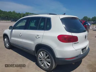 2013 Volkswagen Tiguan SE with VIN WVGAV7AX4DW528410, listed as a IAAI auction lot 42142132 with 148,511 mi miles and . Bid and sale history available at DreamBid. Image 3.