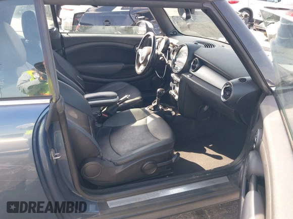 2010 MINI Convertible with VIN WMWMR3C53ATU97865, listed as a IAAI auction lot 41610670 with 154,457 mi miles and . Bid and sale history available at DreamBid. Image 5.