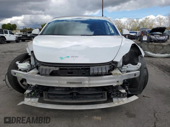 2022 Tesla Model 3 Long Range z VIN 5YJ3E1EB7NF365962, wystawiony jako Copart lot #48601865 z przebiegiem 121 541 mil mil oraz Szkoda całkowita • Salvage title. Historia ofert i sprzedaży dostępna na DreamBid. Obrazek 5.
