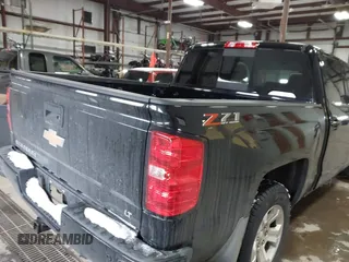 2018 Chevrolet Silverado 1500 LT with VIN 3GCUKREC2JG178119, listed as a IAAI auction lot 41609027 with Not Provided miles. Bid and sale history available at carsss.com. Image 4.