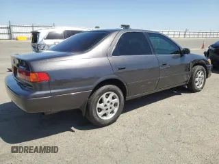 2001 Toyota Camry LE z VIN JT2BF22K010329017, wystawiony jako Copart lot #56035725 z przebiegiem 200 841 mil mil oraz Szkoda całkowita • Salvage title. Historia ofert i sprzedaży dostępna na DreamBid. Obrazek 3.
