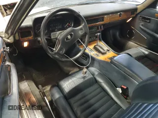 1989 Jaguar XJS z VIN SAJNV4847KC164497, wystawiony jako Copart lot #87258504 z przebiegiem 90 299 mil mil oraz Szkody całkowita. Historia ofert i sprzedaży dostępna na DreamBid. Obrazek 8.