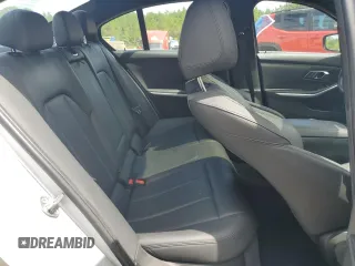 2020 BMW 3 Series 330i with VIN WBA5R1C07LFH40014, listed as a Copart auction lot 60656645 with 76,392 mi miles and Clean title. Bid and sale history available at DreamBid. Image 10.