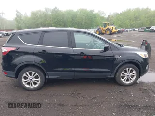 2017 Ford Escape SE with VIN 1FMCU9GD3HUD90154, listed as a IAAI auction lot 42181078 with 106,143 mi miles and . Bid and sale history available at DreamBid. Image 13.