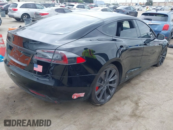 2017 Tesla Model S 60 with VIN 5YJSA1E12HF195965, listed as a IAAI auction lot 41946148 with 63,992 mi miles and . Bid and sale history available at DreamBid. Image 4.