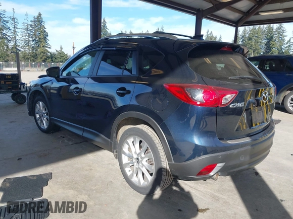 2014 Mazda CX-5 Grand Touring with VIN JM3KE2DY6E0394172, listed as a IAAI auction lot 41698468 with 89,554 mi miles. Bid and sale history available at carsss.com. Image 3.