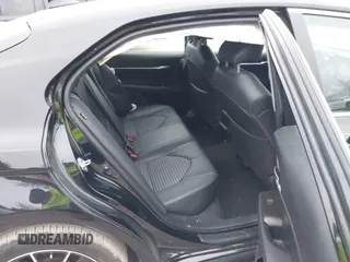 2023 Toyota Camry SE with VIN 4T1G11AK7PU123665, listed as a IAAI auction lot 41142628 with 67,294 mi miles and . Bid and sale history available at DreamBid. Image 8.