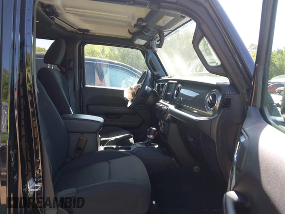 2023 Jeep Wrangler Sahara with VIN 1C4HJXEN5PW702268, listed as a IAAI auction lot 42288704 with 57,240 mi miles and . Bid and sale history available at DreamBid. Image 5.