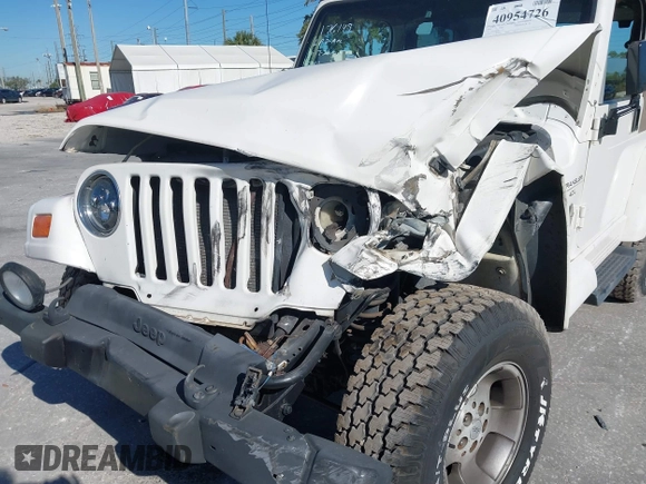2001 Jeep Wrangler Sahara with VIN 1J4FA59S51P332107, listed as a IAAI auction lot 40954726 with 150,671 mi miles. Bid and sale history available at carsss.com. Image 6.