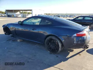 2008 Jaguar XK with VIN SAJWA43C589B23096, listed as a Copart auction lot 79337334 with 143,902 mi miles and Salvage Title. Bid and sale history available at carsss.com. Image 2.