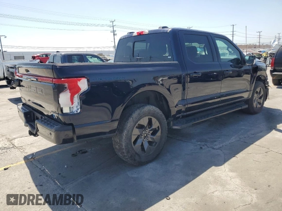 2022 Ford F-150 Lightning Pro z VIN 1FT6W1EV8NWG04113, wystawiony jako Copart lot #57489635 z przebiegiem 48 990 mil mil oraz Szkoda całkowita • Salvage title. Historia ofert i sprzedaży dostępna na DreamBid. Obrazek 3.