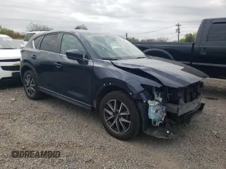 2018 Mazda CX-5 Touring with VIN JM3KFBCM7J0358769, listed as a Copart auction lot 53569775 with 37,198 mi miles and Salvage Title. Bid and sale history available at DreamBid. Image 4.