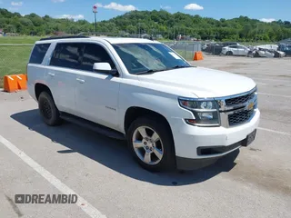 2015 Chevrolet Tahoe LT with VIN 1GNSKBKC8FR194164, listed as a IAAI auction lot 42315215 with 211,797 mi miles and . Bid and sale history available at DreamBid. Image 1.