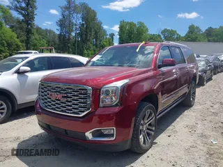 2018 GMC Yukon XL Denali z VIN 1GKS1HKJ6JR312495, wystawiony jako IAAI lot #42177446 z przebiegiem 94 268 mil mil oraz . Historia ofert i sprzedaży dostępna na DreamBid. Obrazek 2.