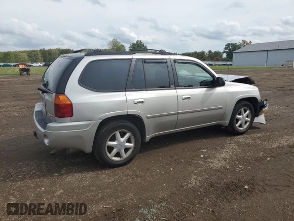 2007 GMC Envoy SLT with VIN 1GKDT13S272265100, listed as a Copart auction lot 73136264 with 245,198 mi miles and Salvage Title. Bid and sale history available at carsss.com. Image 3.