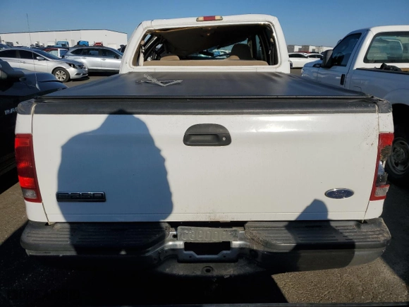 2003 Ford Super Duty F-250 XL with VIN 1FTNW21PX3EB59692, listed as a Copart auction lot 89177265 with 153,200 mi miles and Salvage Title. Bid and sale history available at carsss.com. Image 6.