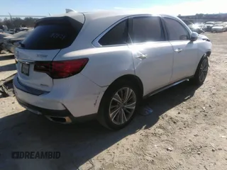 2018 Acura MDX w/Technology Pkg with VIN 5J8YD4H57JL016650, listed as a IAAI auction lot 40979704 with 82,980 mi miles. Bid and sale history available at carsss.com. Image 4.