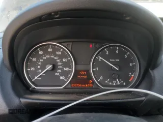 2009 BMW 1 Series 128i with VIN WBAUN13529VH81121, listed as a Copart auction lot 77849094 with 30,756 mi miles and Salvage Title. Bid and sale history available at DreamBid. Image 9.