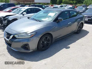 2020 Nissan Maxima SL with VIN 1N4AA6DVXLC373467, listed as a IAAI auction lot 42784055 with 221,014 mi miles and . Bid and sale history available at DreamBid. Image 2.