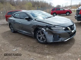 2020 Nissan Maxima SL z VIN 1N4AA6DV9LC360502, wystawiony jako IAAI lot #41919720 z przebiegiem 112 452 mil mil oraz . Historia ofert i sprzedaży dostępna na DreamBid. Obrazek 1.