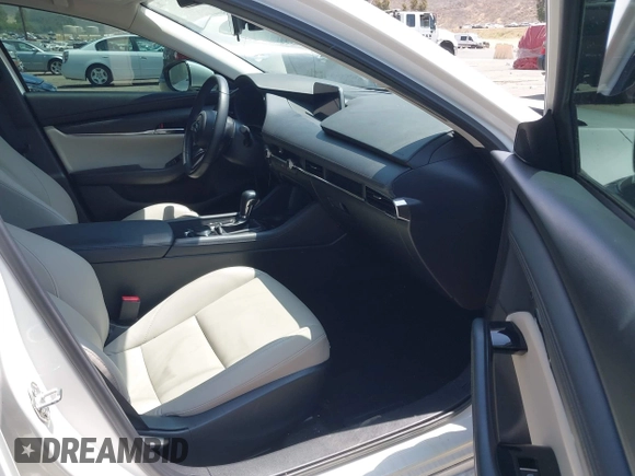 2023 Mazda 3 S Carbon Edition with VIN 3MZBPACM1PM356552, listed as a IAAI auction lot 42603574 with 20,092 mi miles and . Bid and sale history available at DreamBid. Image 5.