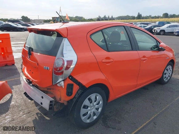 2014 Toyota Prius c One with VIN JTDKDTB32E1065438, listed as a IAAI auction lot 37350203 with 94,630 mi miles. Bid and sale history available at carsss.com. Image 4.