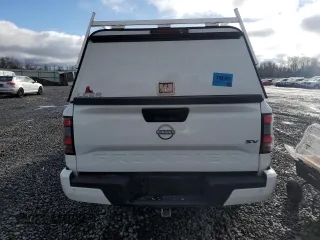 2024 Nissan Frontier SV with VIN 1N6ED1FJXRN637443, listed as a Copart auction lot 49068835 with 6,600 mi miles and Salvage title. Bid and sale history available at DreamBid. Image 6.