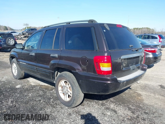 2004 Jeep Grand Cherokee with VIN 1J8GX48S24C266933, listed as a IAAI auction lot 41497122 with 200,899 mi miles and . Bid and sale history available at DreamBid. Image 3.
