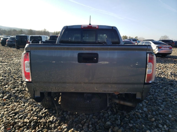 2021 GMC Canyon 4WD AT4 w/Cloth with VIN 1GTG6FEN0M1236099, listed as a Copart auction lot 80911974 with 122,672 mi miles and Salvage Title. Bid and sale history available at carsss.com. Image 6.