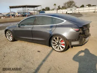 2019 Tesla Model 3 Long Range with VIN 5YJ3E1EB0KF238370, listed as a Copart auction lot 42452465 with 60,857 mi miles and Salvage Title. Bid and sale history available at carsss.com. Image 2.
