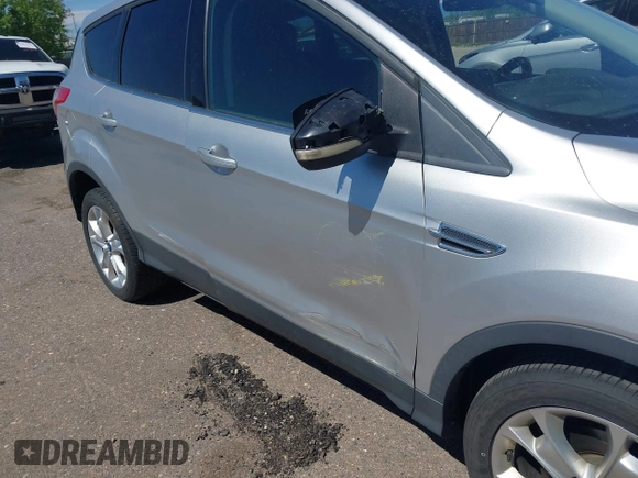 2013 Ford Escape SEL with VIN 1FMCU9HX0DUD42081, listed as a IAAI auction lot 42293456 with 100,013 mi miles and . Bid and sale history available at DreamBid. Image 6.
