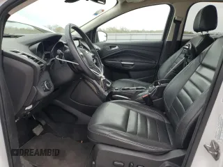 2016 Ford Escape Titanium with VIN 1FMCU9JX6GUB85980, listed as a Copart auction lot 51748715 with 129,537 mi miles and Salvage Title. Bid and sale history available at carsss.com. Image 7.