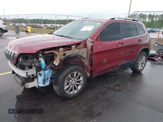 2019 Jeep Cherokee Latitude Plus with VIN 1C4PJMLB2KD104856, listed as a IAAI auction lot 42097709 with 89,552 mi miles and . Bid and sale history available at DreamBid. Image 2.