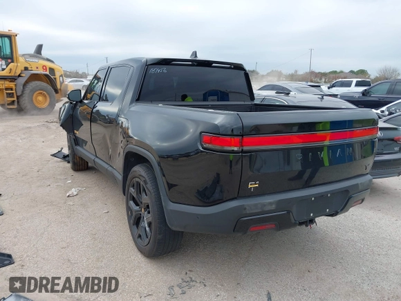 2023 Rivian R1T Adventure with VIN 7FCTGAAA2PN023485, listed as a IAAI auction lot 41227330 with 1 mi miles. Bid and sale history available at carsss.com. Image 3.