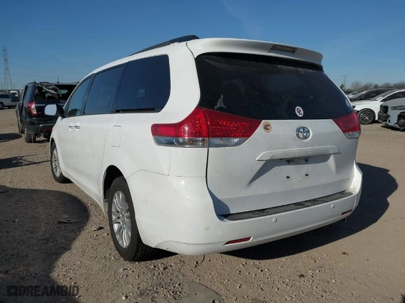 2013 Toyota Sienna XLE AAS with VIN 5TDYK3DC3DS308298, listed as a IAAI auction lot 41292280 with 165,638 mi miles. Bid and sale history available at carsss.com. Image 3.