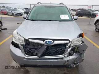 2015 Subaru Forester Touring with VIN JF2SJAUC8FH467730, listed as a IAAI auction lot 42403195 with 142,287 mi miles and . Bid and sale history available at DreamBid. Image 12.