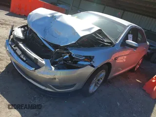 2016 Ford Taurus SEL with VIN 1FAHP2E91GG107258, listed as a IAAI auction lot 41744087 with 135,505 mi miles and . Bid and sale history available at DreamBid. Image 2.