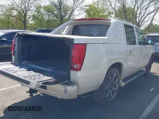 2004 Cadillac Escalade EXT z VIN 3GYEK62N34G304883, wystawiony jako IAAI lot #42149493 z przebiegiem 177 911 mil mil oraz . Historia ofert i sprzedaży dostępna na DreamBid. Obrazek 4.