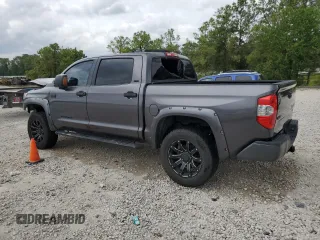 2014 Toyota Tundra 4WD Truck SR5 with VIN 5TFDW5F14EX372260, listed as a Copart auction lot 70322274 with 193,551 mi miles and Salvage Title. Bid and sale history available at carsss.com. Image 2.