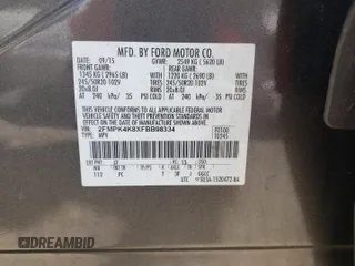 2015 Ford Edge Titanium z VIN 2FMPK4K8XFBB98334, wystawiony jako Copart lot #56953495 z przebiegiem 110 129 mil mil oraz Szkody całkowita. Historia ofert i sprzedaży dostępna na DreamBid. Obrazek 13.