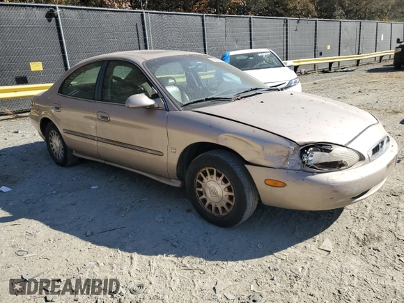 1999 Mercury Sable LS z VIN 1MEFM53S7XG602788, wystawiony jako Copart lot #76894294 z przebiegiem 186 315 mil mil oraz Szkoda całkowita • Salvage title. Historia ofert i sprzedaży dostępna na DreamBid. Obrazek 4.