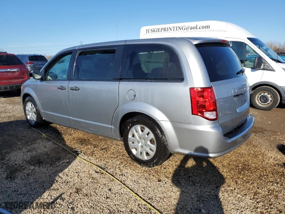 2019 Dodge Grand Caravan SE with VIN 2C4RDGBG1KR793915, listed as a Copart auction lot 48999535 with 69,487 mi miles and Salvage Title. Bid and sale history available at carsss.com. Image 2.