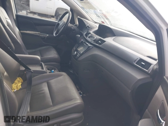 2017 Honda Odyssey EX-L with VIN 5FNRL5H62HB014449, listed as a IAAI auction lot 41736940 with 205,144 mi miles and . Bid and sale history available at DreamBid. Image 5.
