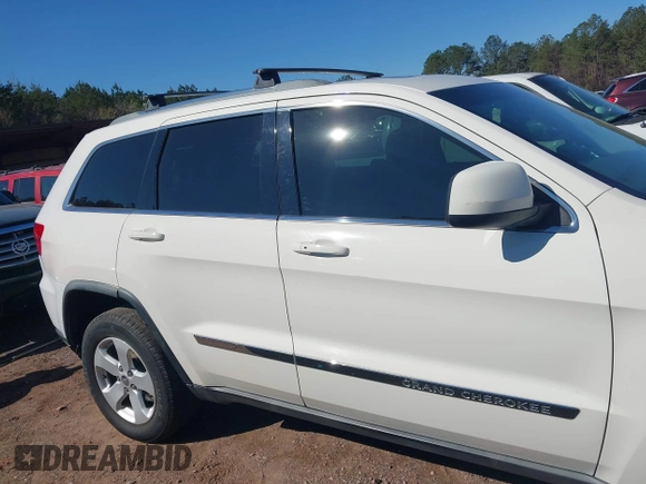 2012 Jeep Grand Cherokee Laredo with VIN 1C4RJEAG5CC106203, listed as a IAAI auction lot 41821138 with 157,474 mi miles. Bid and sale history available at carsss.com. Image 13.